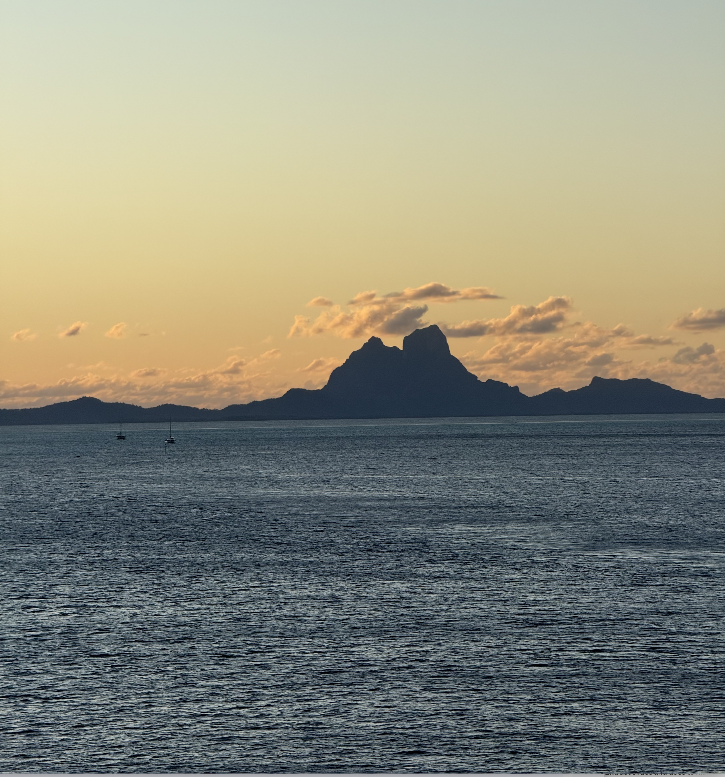 Mt. Otemanu in silhouette against a golden Bora Bora sunset